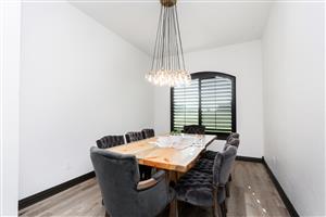 Outdoor kitchen to indoor formal dining After